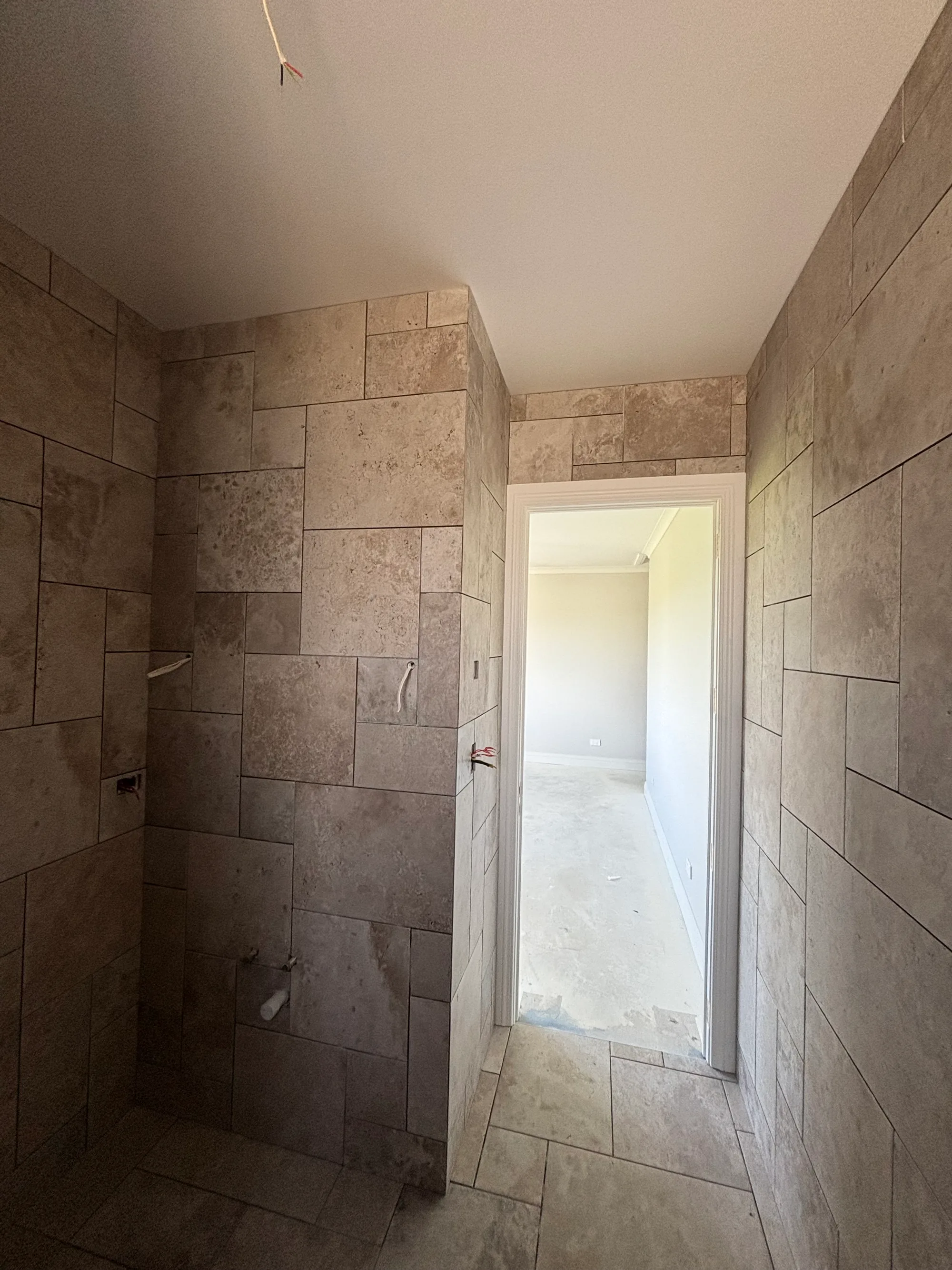 Bathroom tiling completed - Watcon Projects Auckland