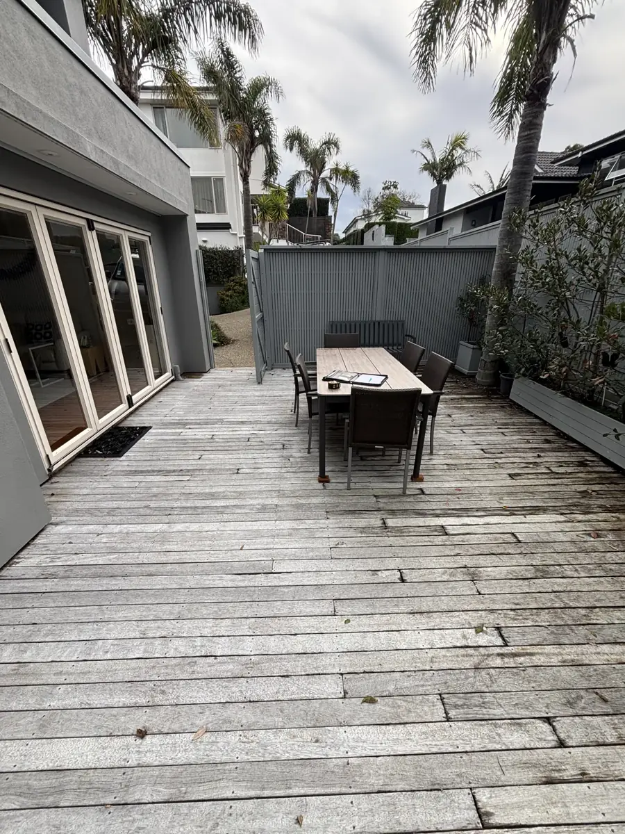 Weathered grey deck boards before the rebuild, South Auckland home