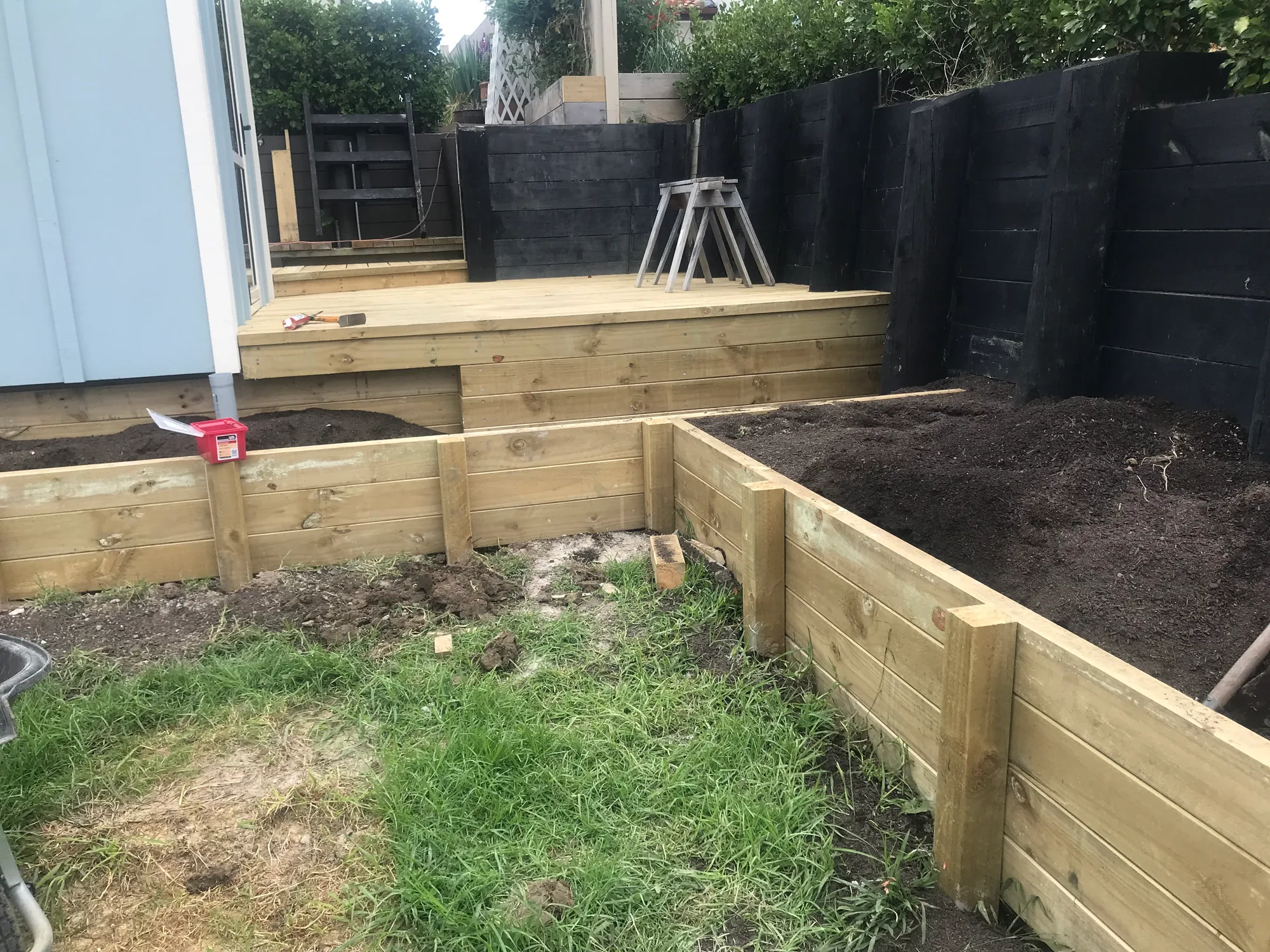 Timber sleeper retaining wall - Watcon Projects South Auckland